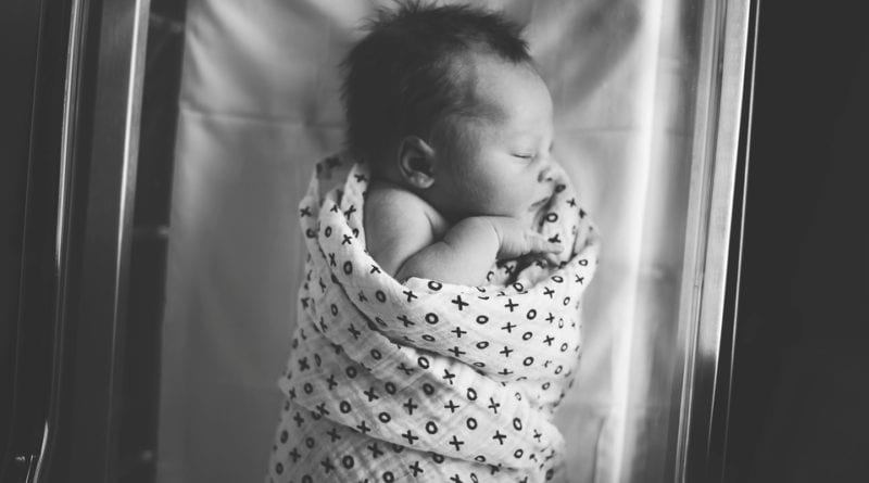 Swaddling A Baby (Pros and Cons) - Baby Swaddled