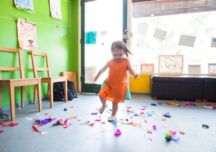 -Girl Running In Classroom